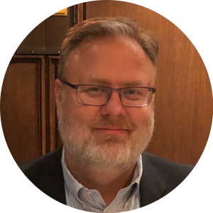 Headshot-Tom Roberts-round.png